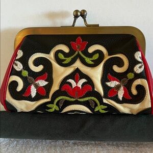 Embroidered Black and Red leather clutch by Isabella Fiore